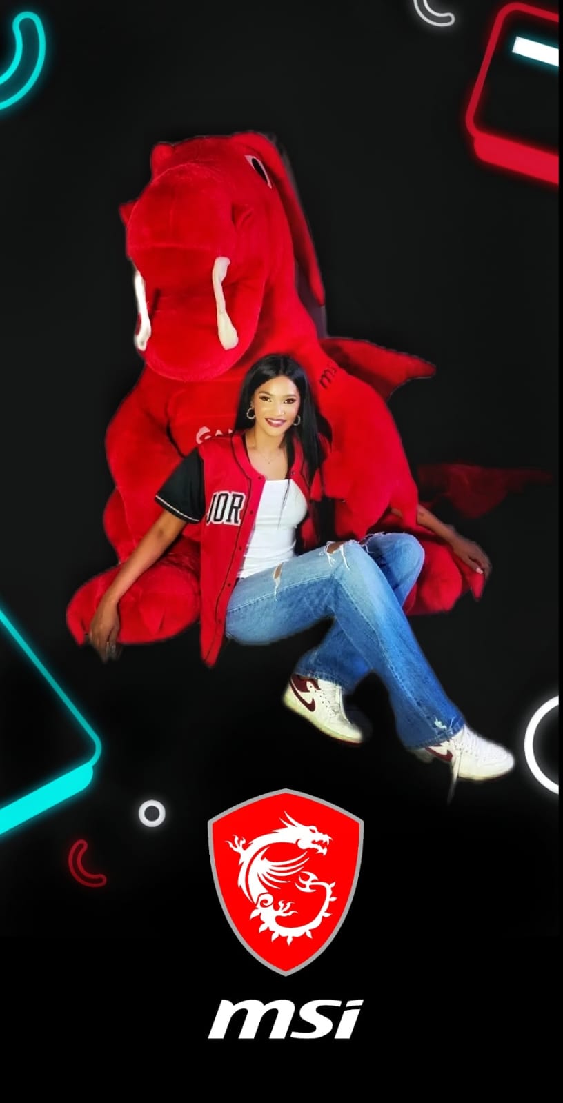 Shoma Govender in an MSI photograph, seated with the MSI dragon mascot